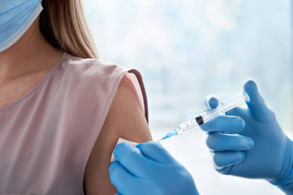 Female patient getting vaccinated
